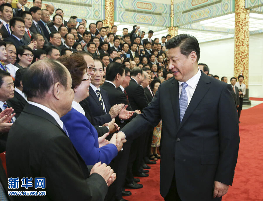 习近平在北京会见第七届世界华侨华人社团联谊大会代表